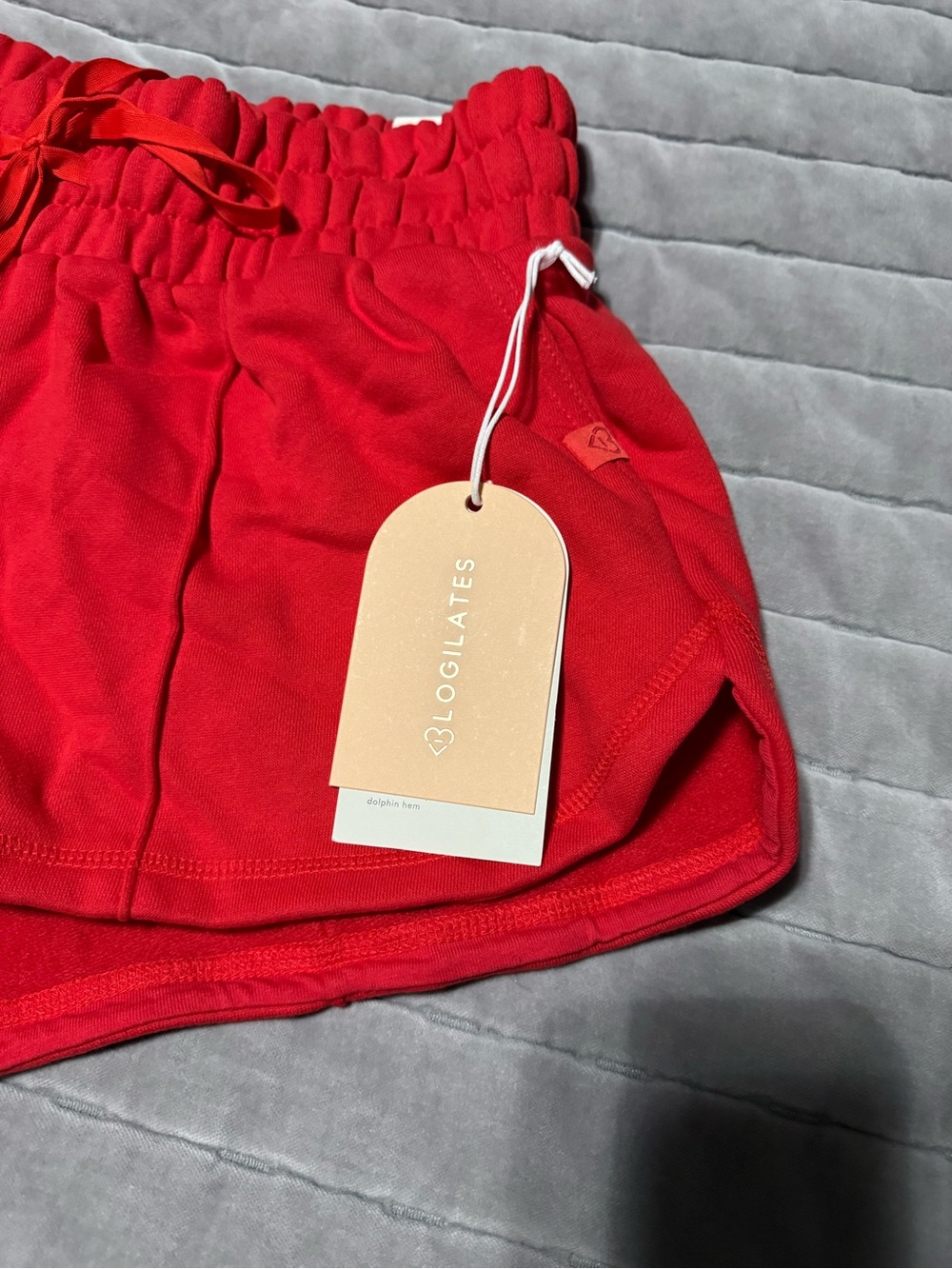 Blogilates Marshmallow Dolphin Red Athletic Shorts with Drawstring